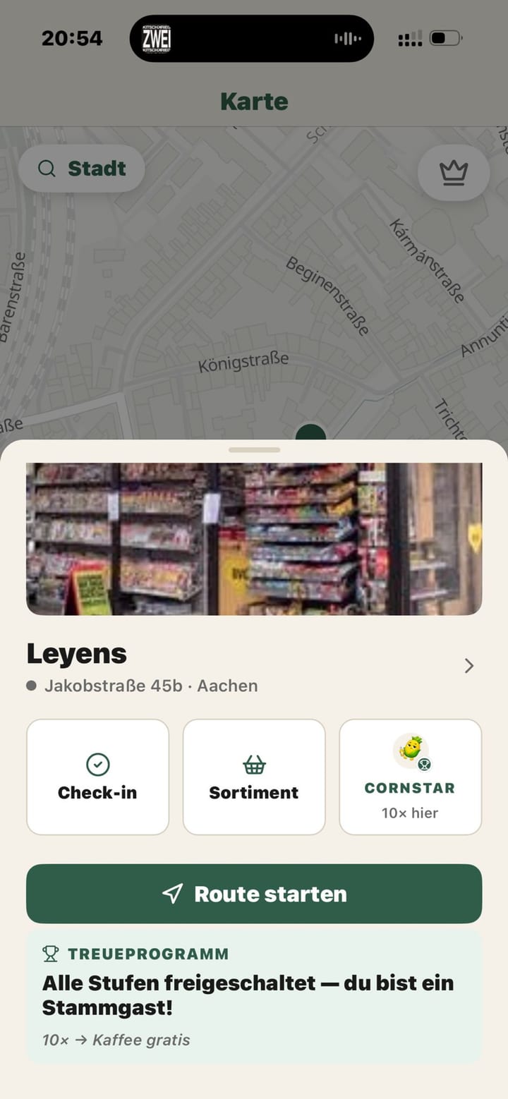 Kiosk-Detail mit Check-in, Sortiment und Treueprogramm
